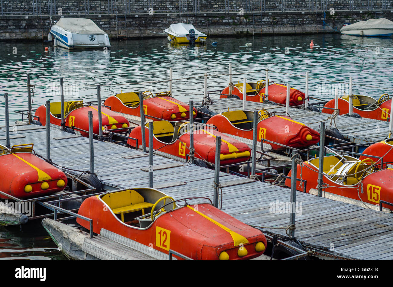 Berthing river cars, the quay of Como lake, Italy Stock Photo