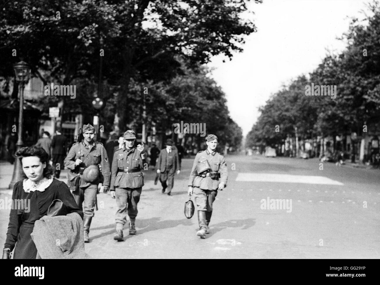 Paris, German soldiers walking down empty boulevards June 14-17 1940 World War II - France Paris. Bibliothèque nationale Stock Photo