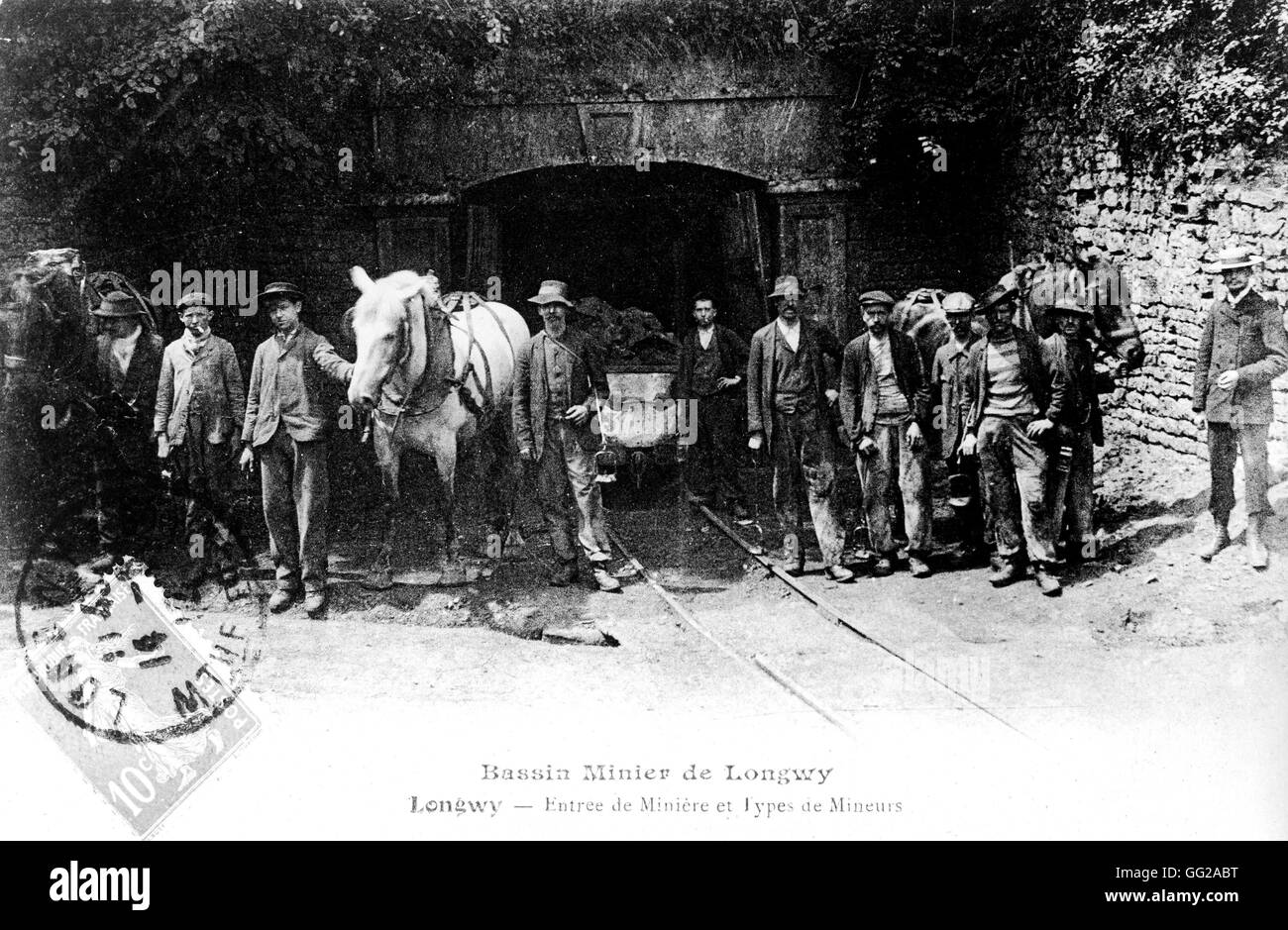 Postcard showing miners entering the mineral basin of Longwy Early 20th century France Institut d'histoire du syndicalisme Stock Photo