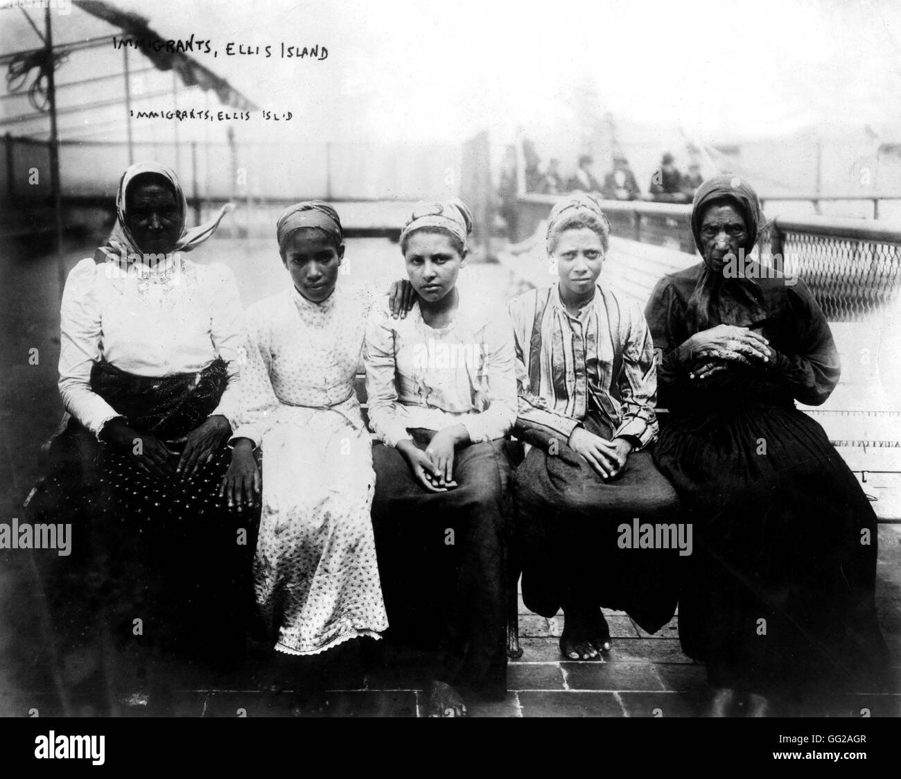 Photograph by Geo. G. Bain. Immigrants at Ellis Island Around 1900 United States Washington. Library of Congress Stock Photo