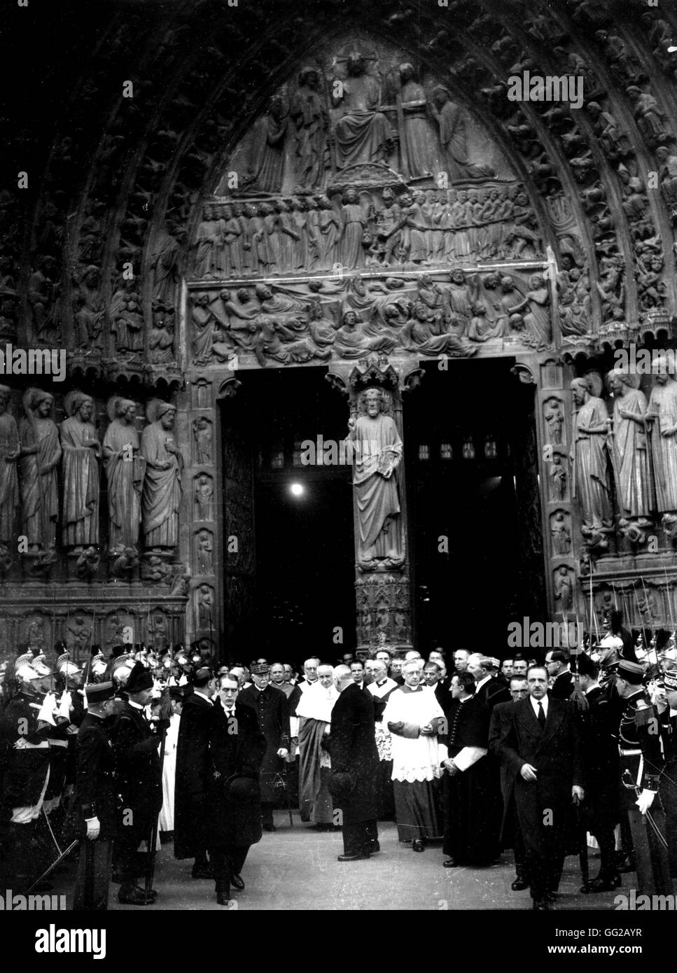 Vichy Government. Petain in Paris, acccompanied by Cardinal Suchard and Suchard, leaving a mass at Notre-Dame April 1944 France - World War 1 Paris. National Library Stock Photo