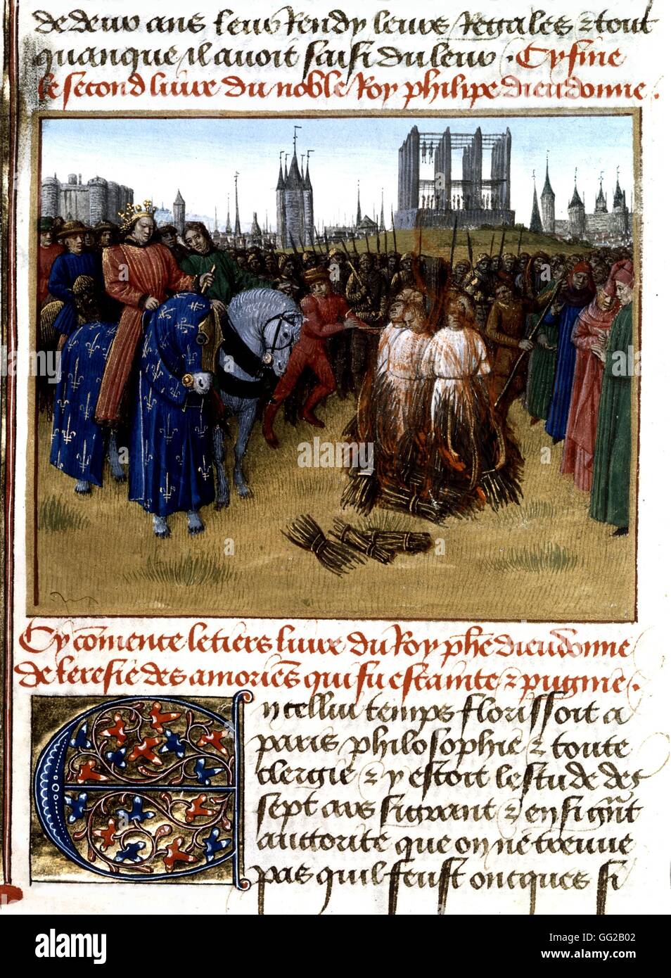 Miniature de Jean Fouquet. Torture of the heretics, partisans of Amaury of Chartres, burnt in Paris in the presence of Philip the Fair. In the background, the gallows of Montfaucon, the Bastille and the Temple.  15th century Paris, Bibliothèque nationale Stock Photo