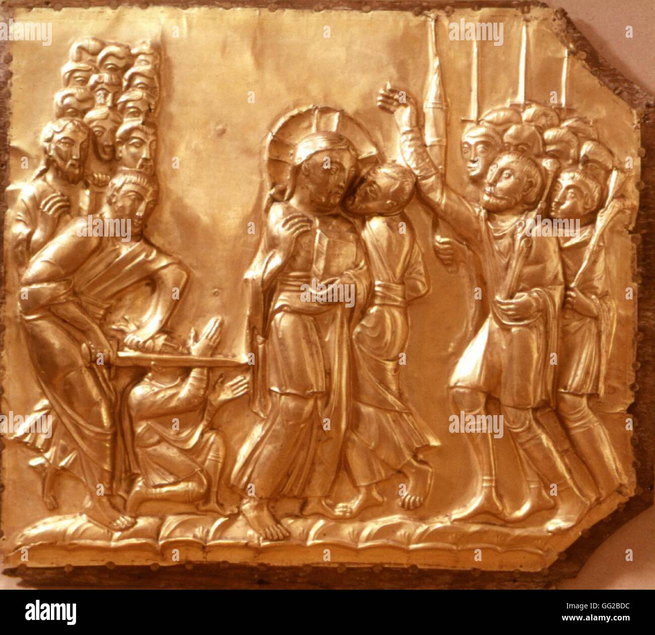 Altarpiece of the Aachen Cathedral in Germany (Pala d'oro). Detail of one of the Biblical scene of the Passion (here, Judas kiss) Golden altarpiece made between 1000 and 1020 and received as a gift from Otto III. Stock Photo