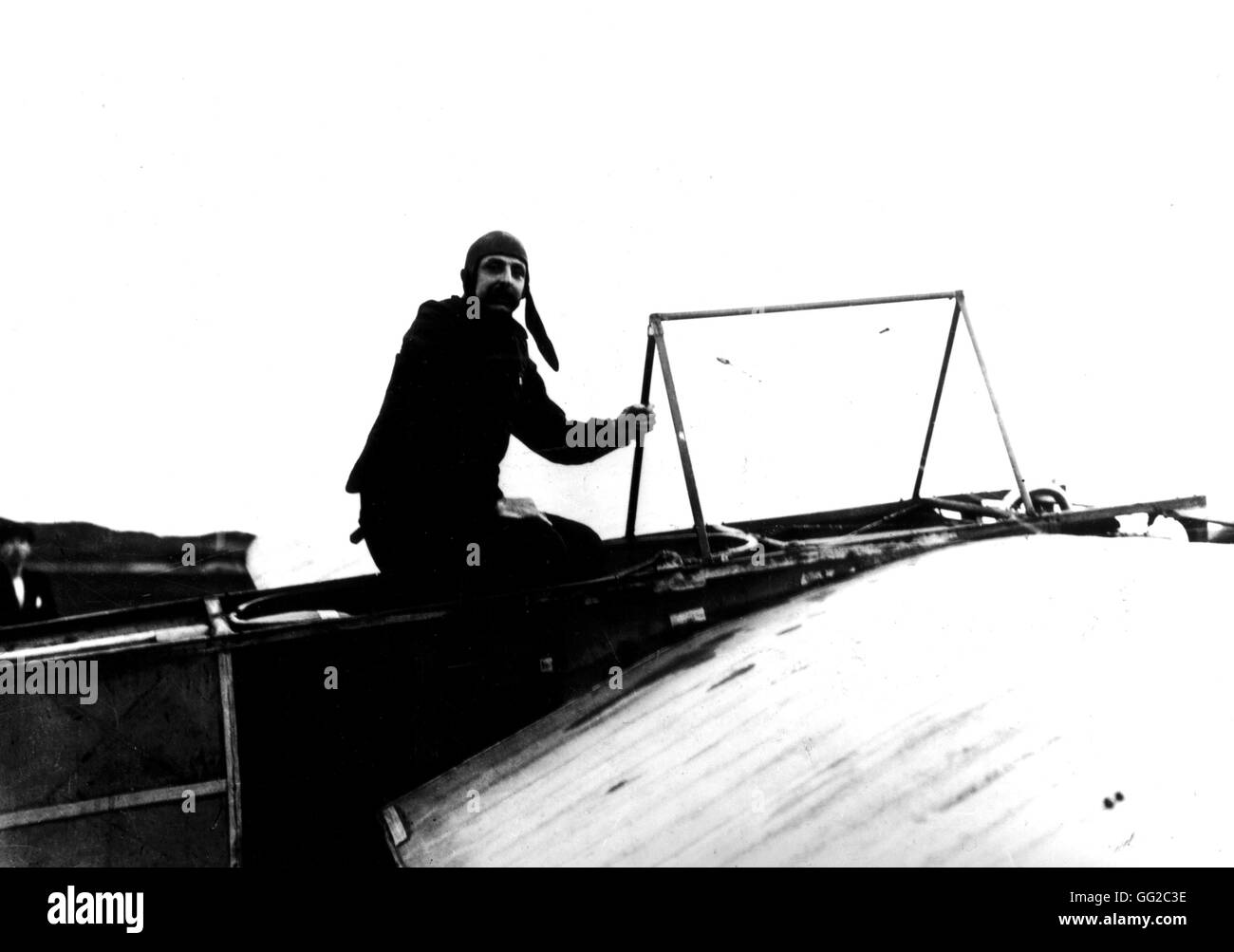 Blériot crossing the English Channel. Here, in his cockpit, in Calais, at 4 a.m. July 25, 1909 France Paris. Bibliothèque Nationale Stock Photo