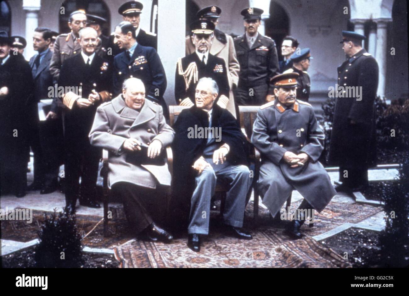 Yalta Conference (Crimea). Churchill, Roosevelt and Stalin, in the foreground. Admiral D. Leahy (behind Roosevelt), sir A. Cunningham (behind Churchill). On the left, E. Estattinius and Molotov can be seen. February 1945 U.S.S.R. - World War II U.S. Army Stock Photo