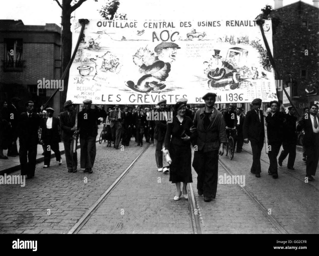 The Renault factories being evacuated in Paris in 1936 Many workers are going on strike since the rise to power of the Popular Front in France. Stock Photo