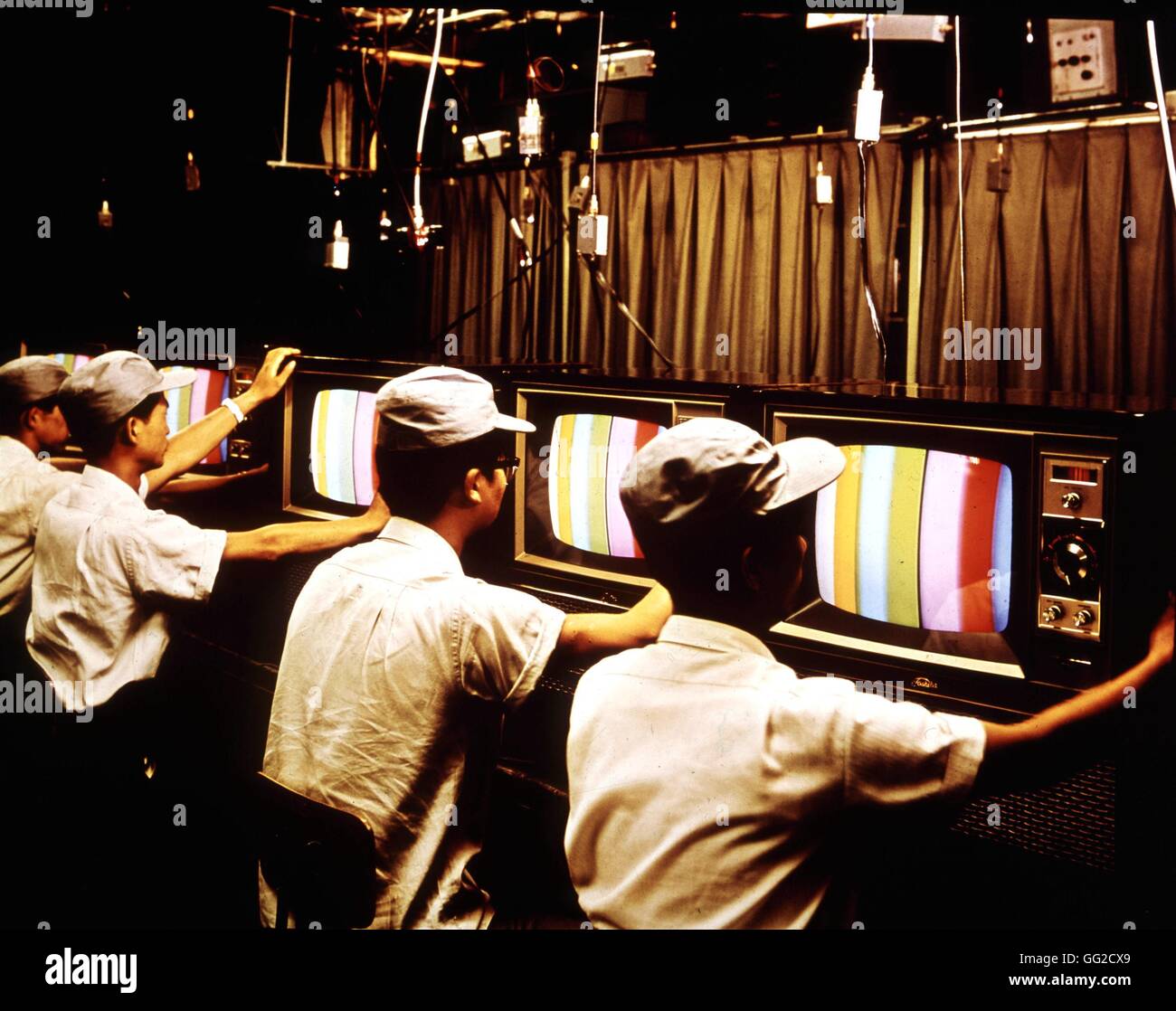 Adjustment of one of the first colour TV  c.1970 Japan Stock Photo