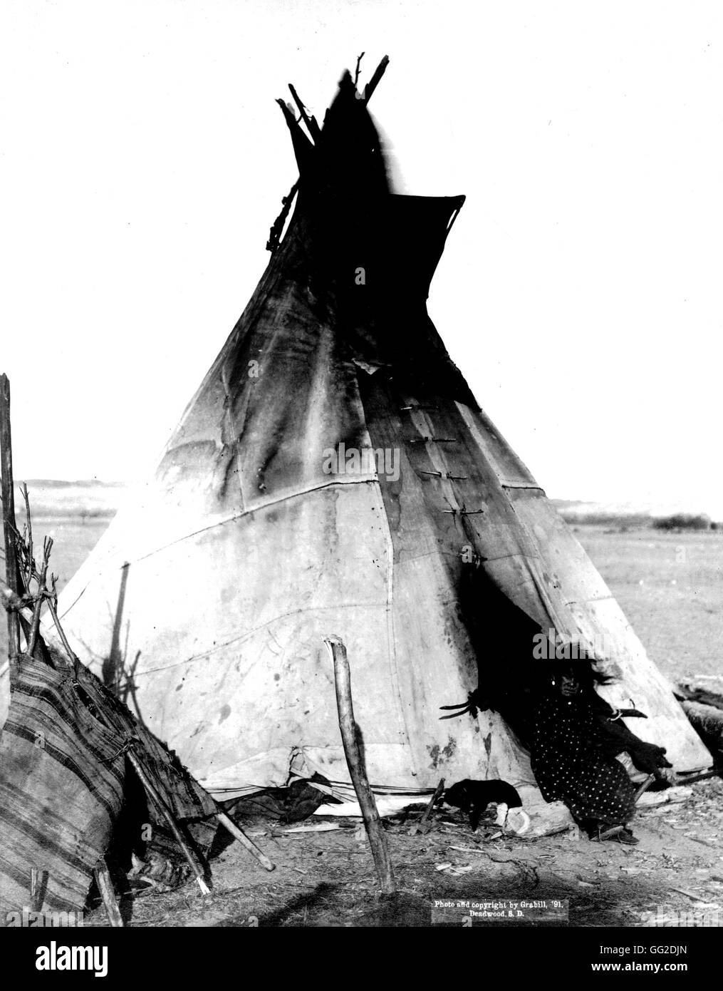 An Indian in his tepee Photo Grabill 1891 United States Washington. Library of Congress Stock Photo