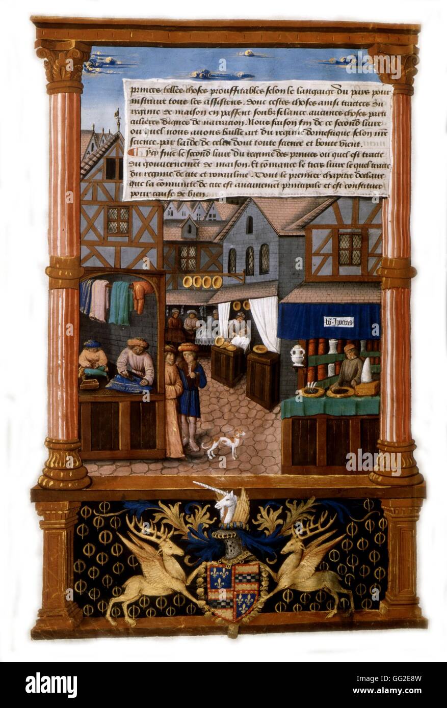 Gilles de Rome Book of the government by Princes. View of a street in the Middle Ages. Clothier, barber, pharmacist. c.1510  France Paris. Bibliothèque de l'arsenal Stock Photo