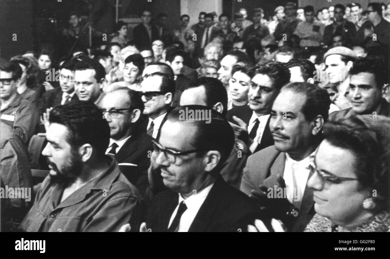 At the television studio, those taking part in Fidel Castro's broadcast.  Among others: Dr. Osvaldo Dorticas Torrado, President of the Republic, accompanied by his wife, Che Guevara, Minister of Industry and companion Blas Roca 1964 Cuba Stock Photo