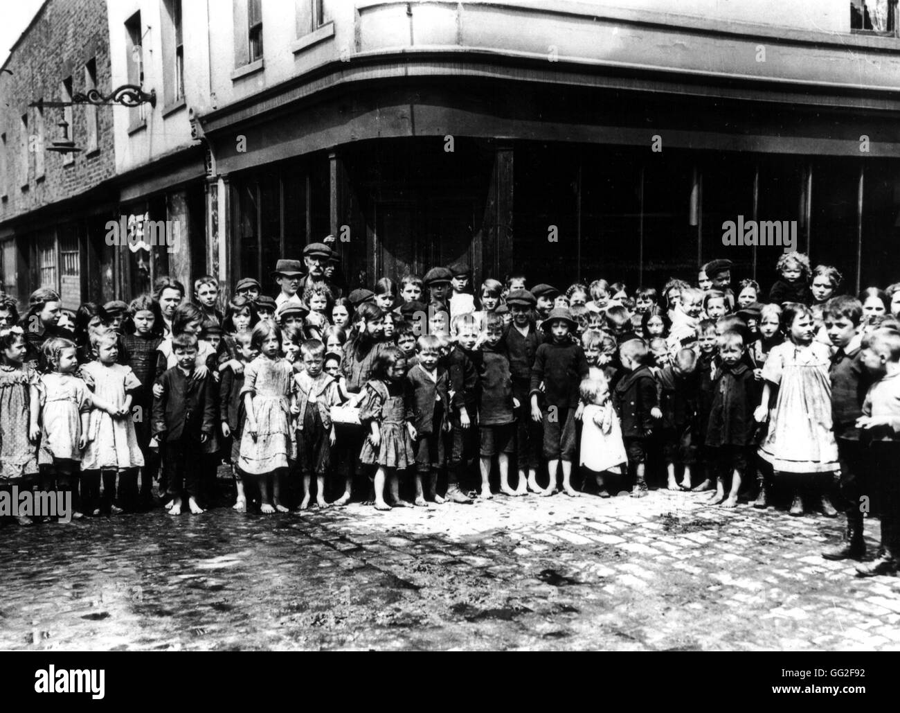 London, children waiting for a free meal distribution at Salmon's Lane