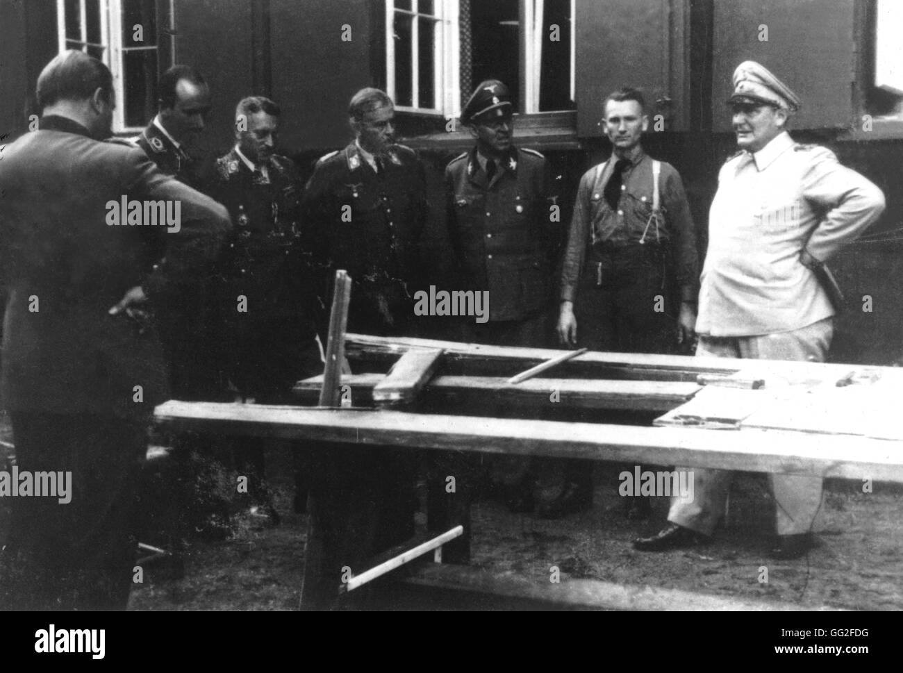 After the assassination attempt against Hitler. Göering, Schaub (3rd on the r.), Koller  (3rd on the l.) and Fegelein look at the site. July 20, 1944 Germany - Second World War Stock Photo