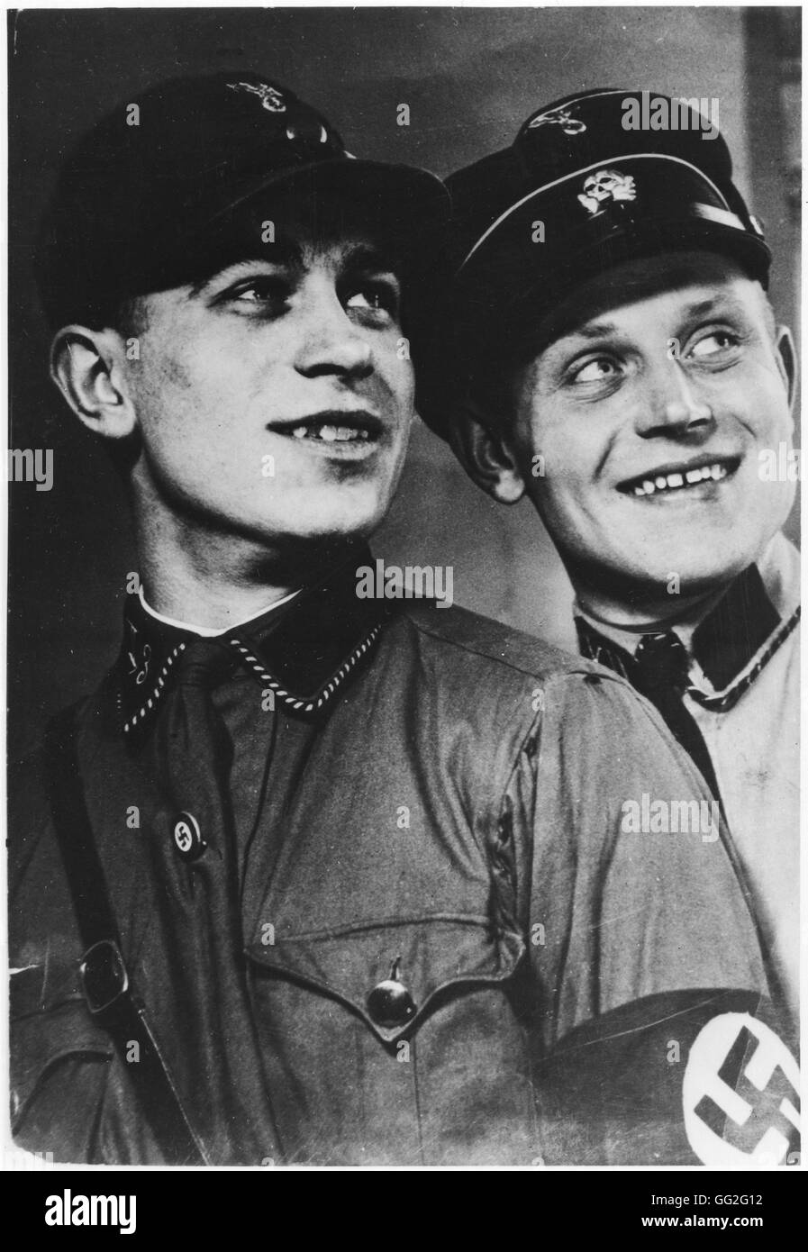 Two young SA members, one of them wearing the skull on his cap.  Germany 1933. Stock Photo