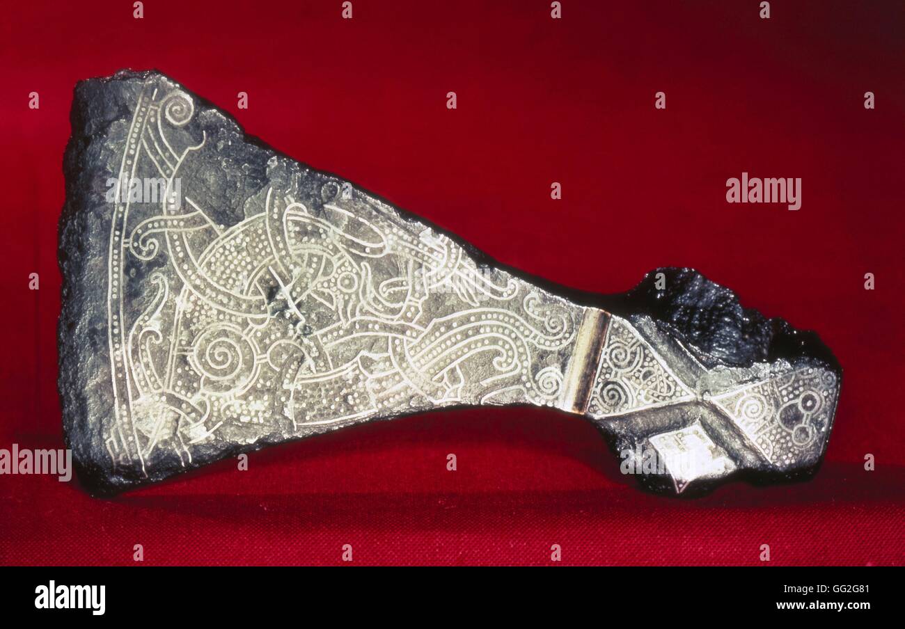 Viking art The great axe from Mammen, Jutland. The design, inlaid with silver wire, depicts a bird-animal with limbs like acanthus and spiralling thighs. 10th century Copenhagen, National museum Stock Photo