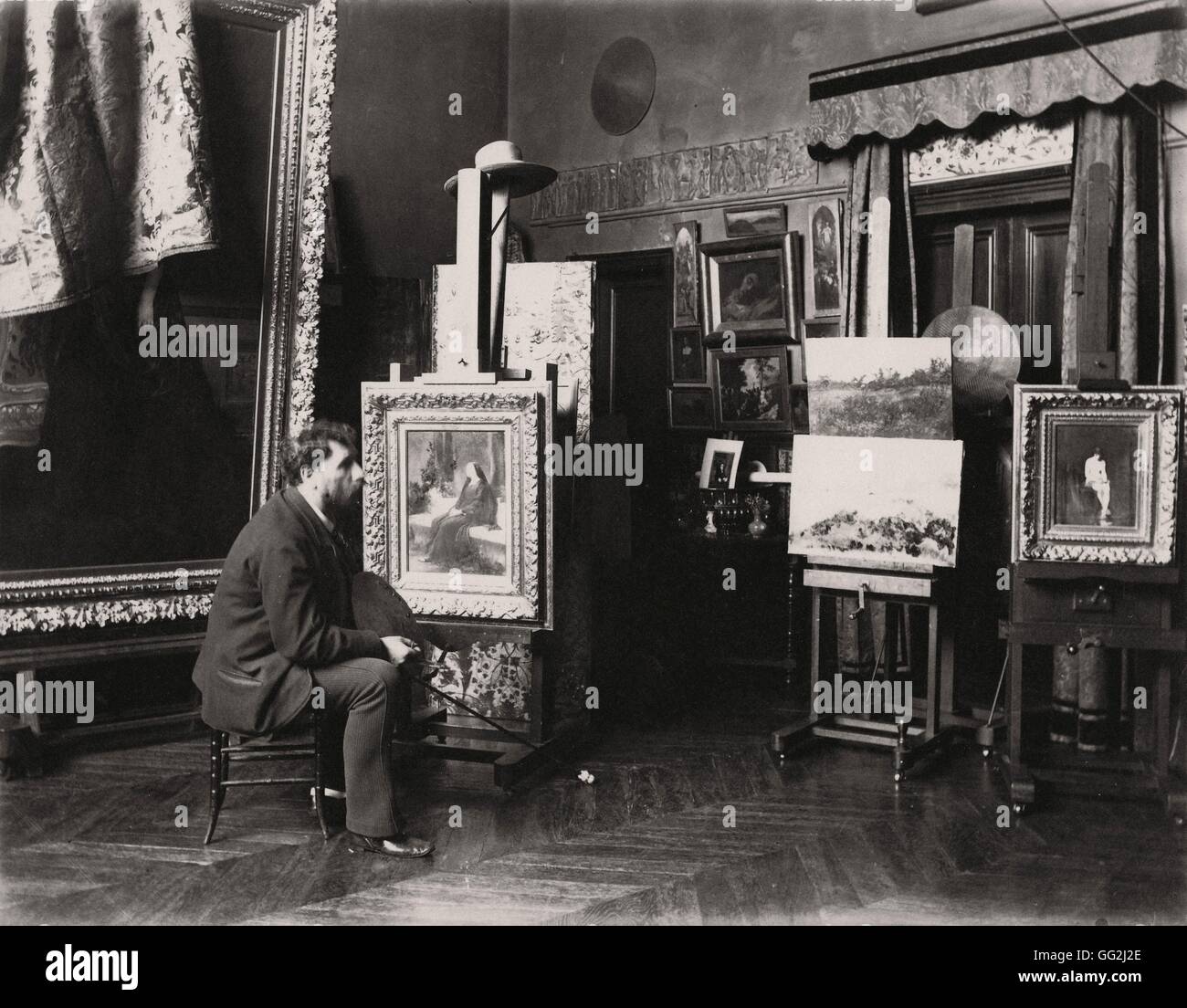 French painter Tony Robert-Fleury in his Paris studio, circa 1885. Photograph by Edmond Bénard. Albumen print. Stock Photo