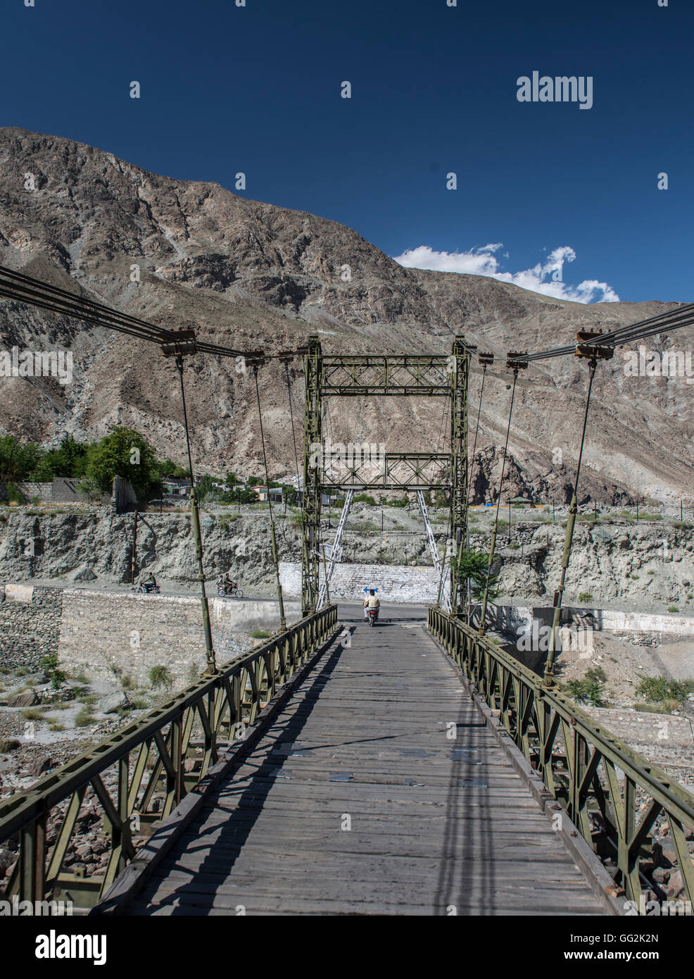 Footbridge in northern Pakistan Stock Photo