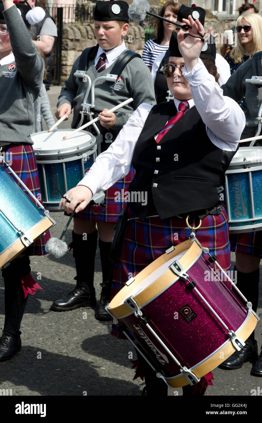 The Preston Lodge High School pipe band taking part in the local Port Seaton gala parade, East Lothian, Scotland. Stock Photo