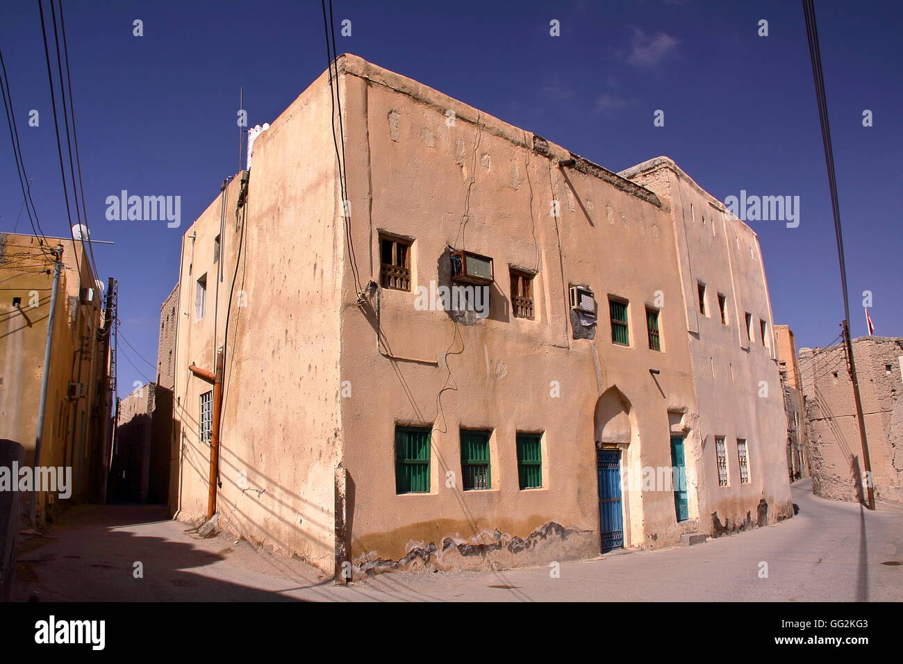 Traditional houses in Al Aqr, old walled quarter inside Nizwa, Western Hajar, Oman Stock Photo