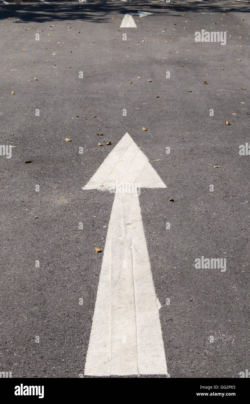 arrow symbol on road in forward direction Stock Photo
