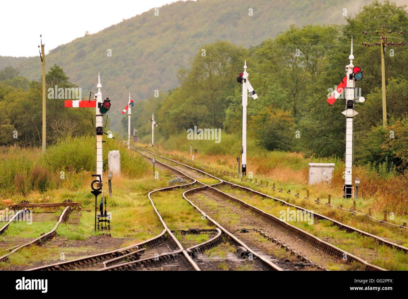 Semaphore signals on the North Yorkshire Moors Railway, seen from the platform at Levisham station. Stock Photo