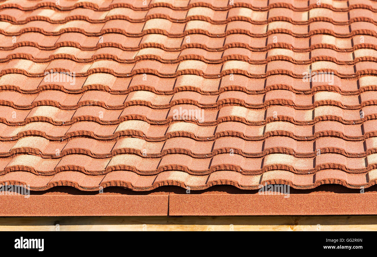 Detail of a house red roof tiles background Stock Photo