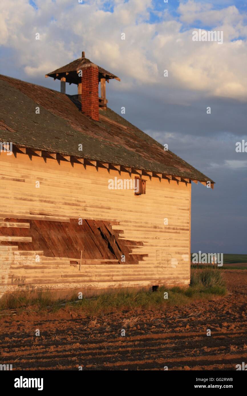Deserted farm building by the roadside in rural Washington state, USA