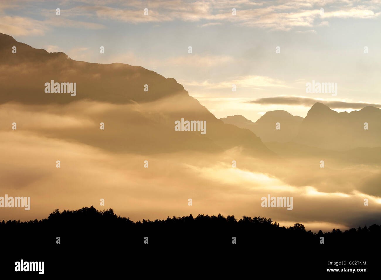 Fog creeping up Valle del Ara, Huesca, Spain Stock Photo
