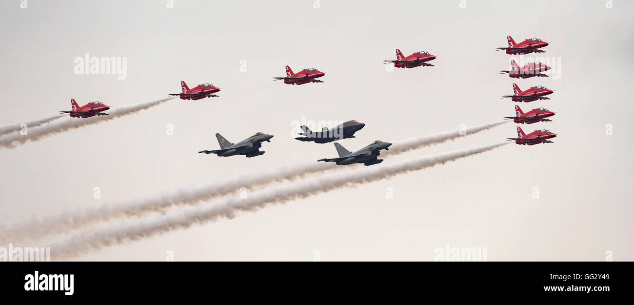 F35B lightning ll Red Arrows Display Team and Eurofighter(s) in formation flypast at Royal International air Tattoo 2016 Stock Photo