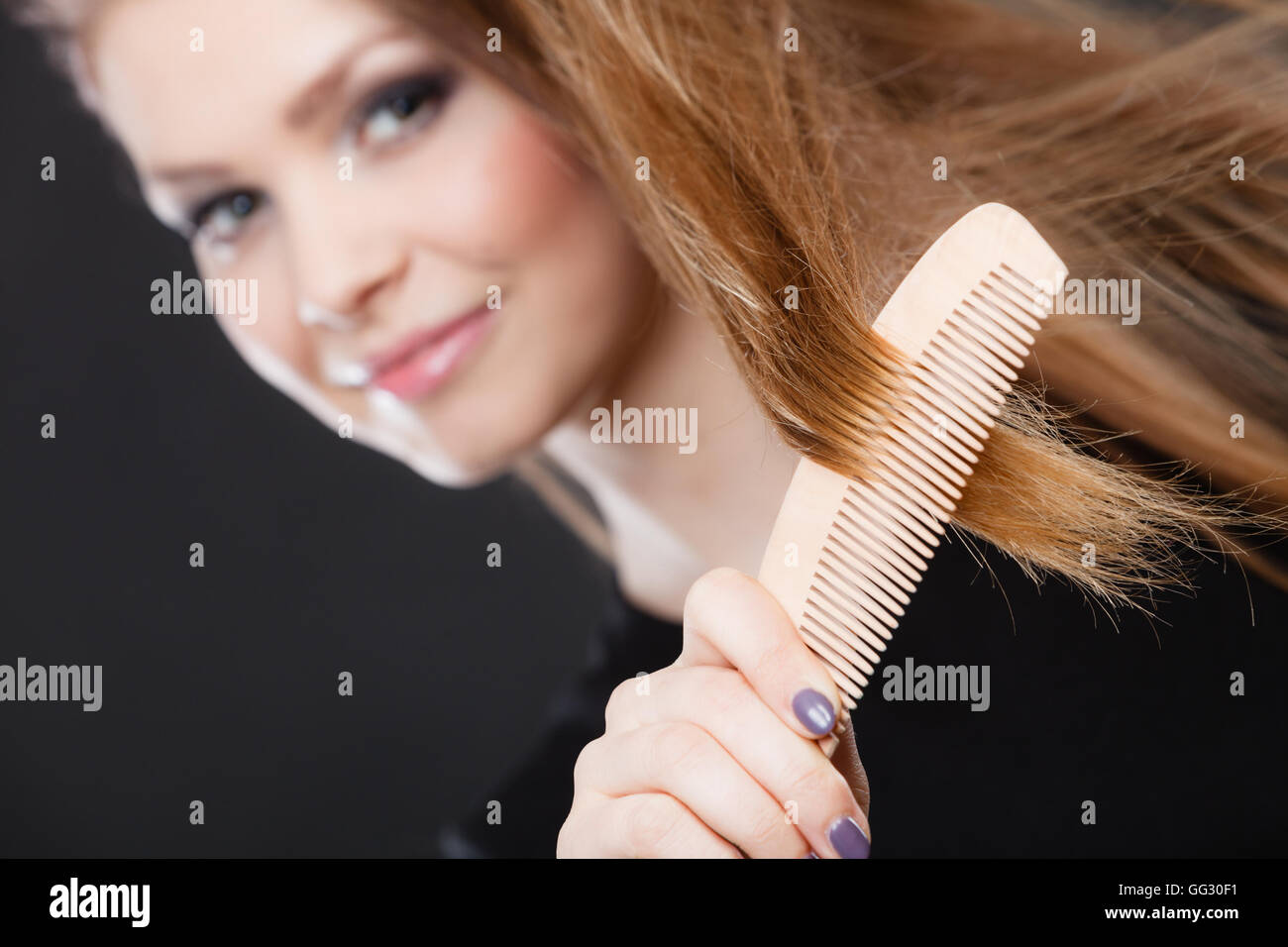 Healthy Look Concept Girl Combing Brushing Her Hair By Using