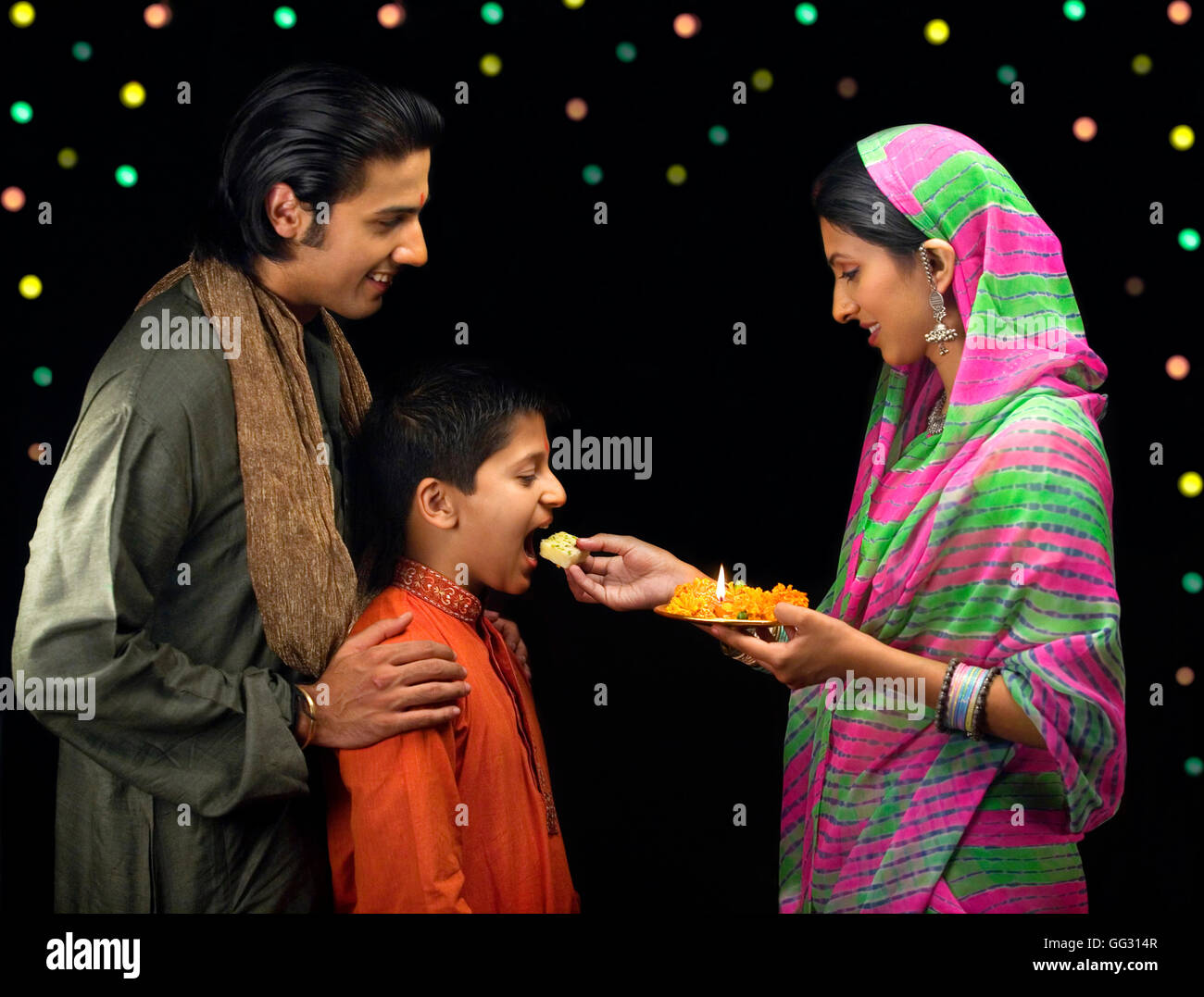 Family celebrating diwali Stock Photo