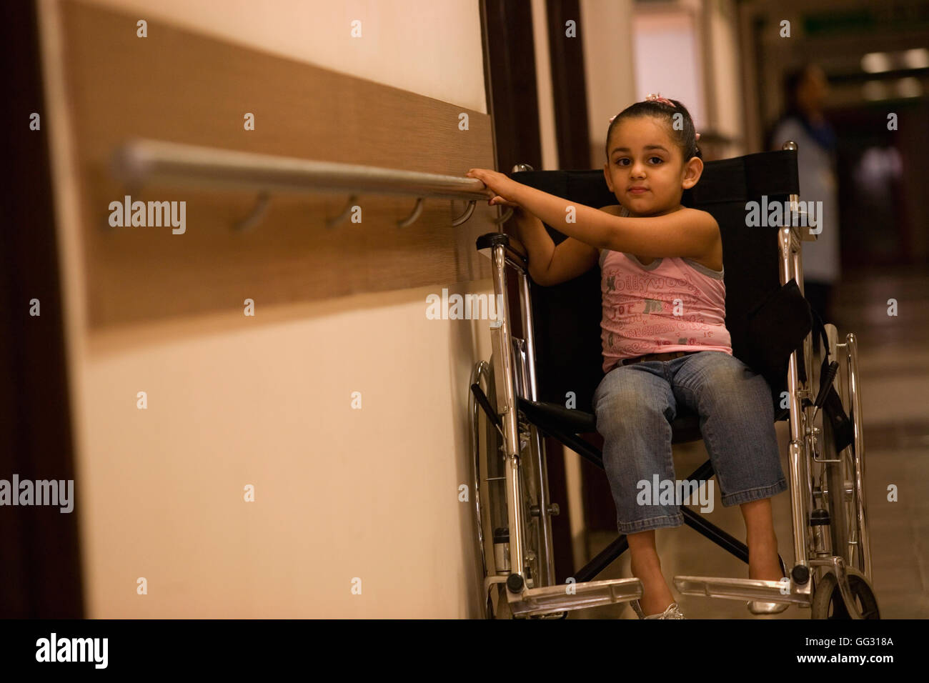 Girl On Wheelchair High Resolution Stock Photography and Images - Alamy