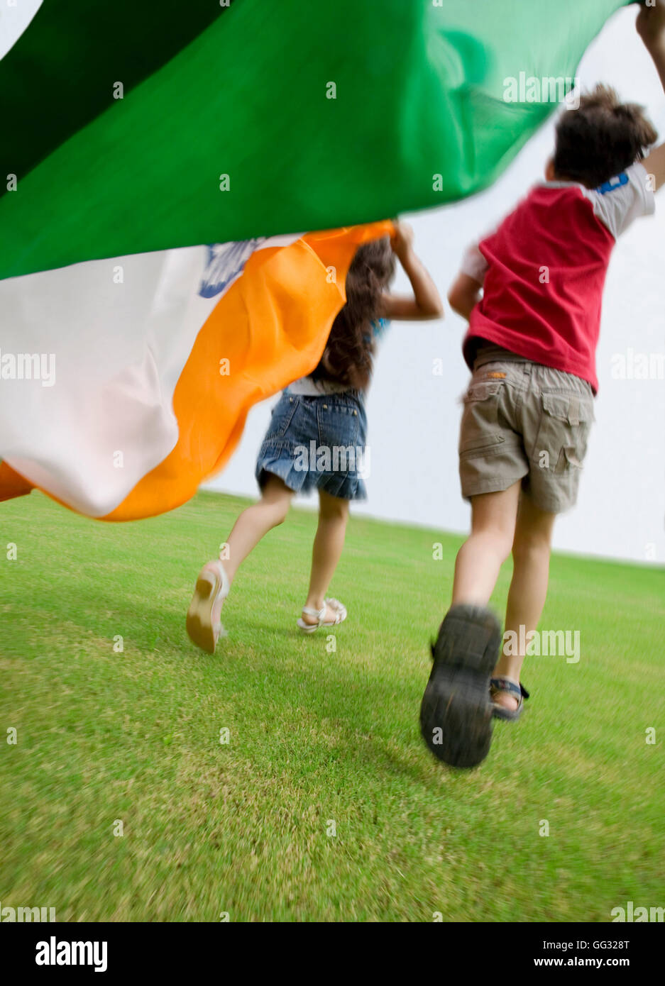 Children running with the Indian Flag Stock Photo