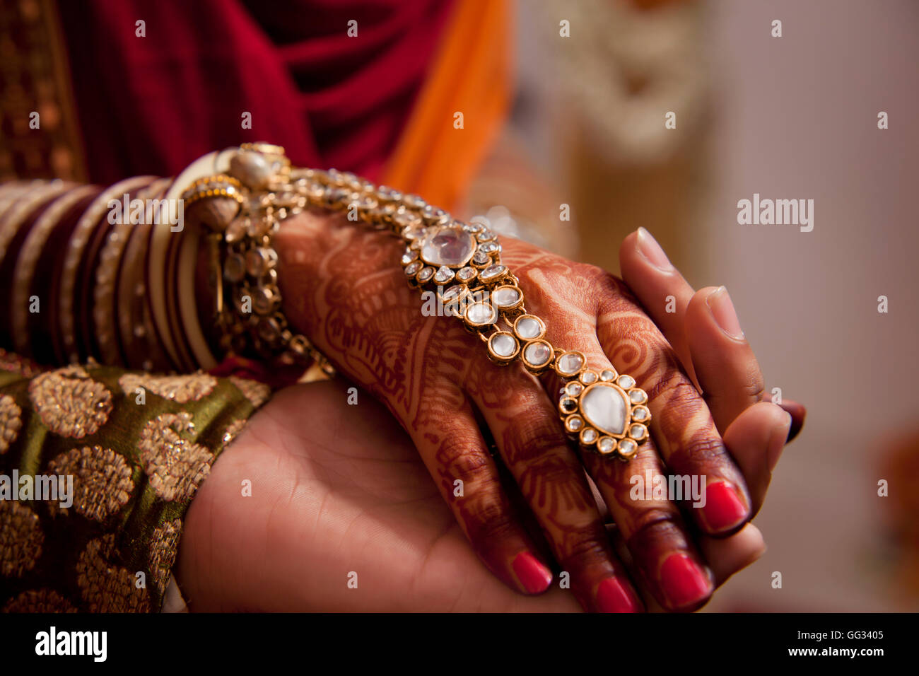 Close-up of human hands holding each other Stock Photo