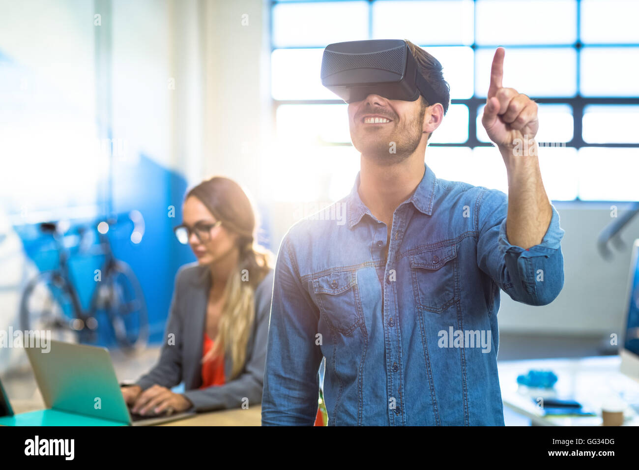 Male graphic designer using the virtual reality headset Stock Photo Alamy