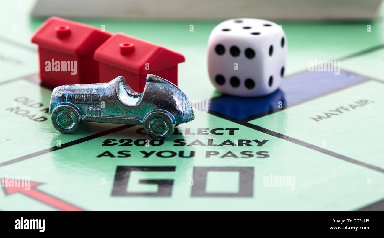 English Edition of Monopoly showing Pass Go,  The classic trading game from Parker Brothers Stock Photo