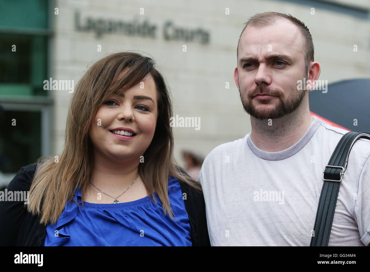 Joanne Meadows and Leonard Collins, joint owners of a dog called Hank, arrive at Laganside Courts in Belfast, after a judge ruled that their dog, seized by Belfast City Council under dangerous dogs legislation, is able to return home. Stock Photo