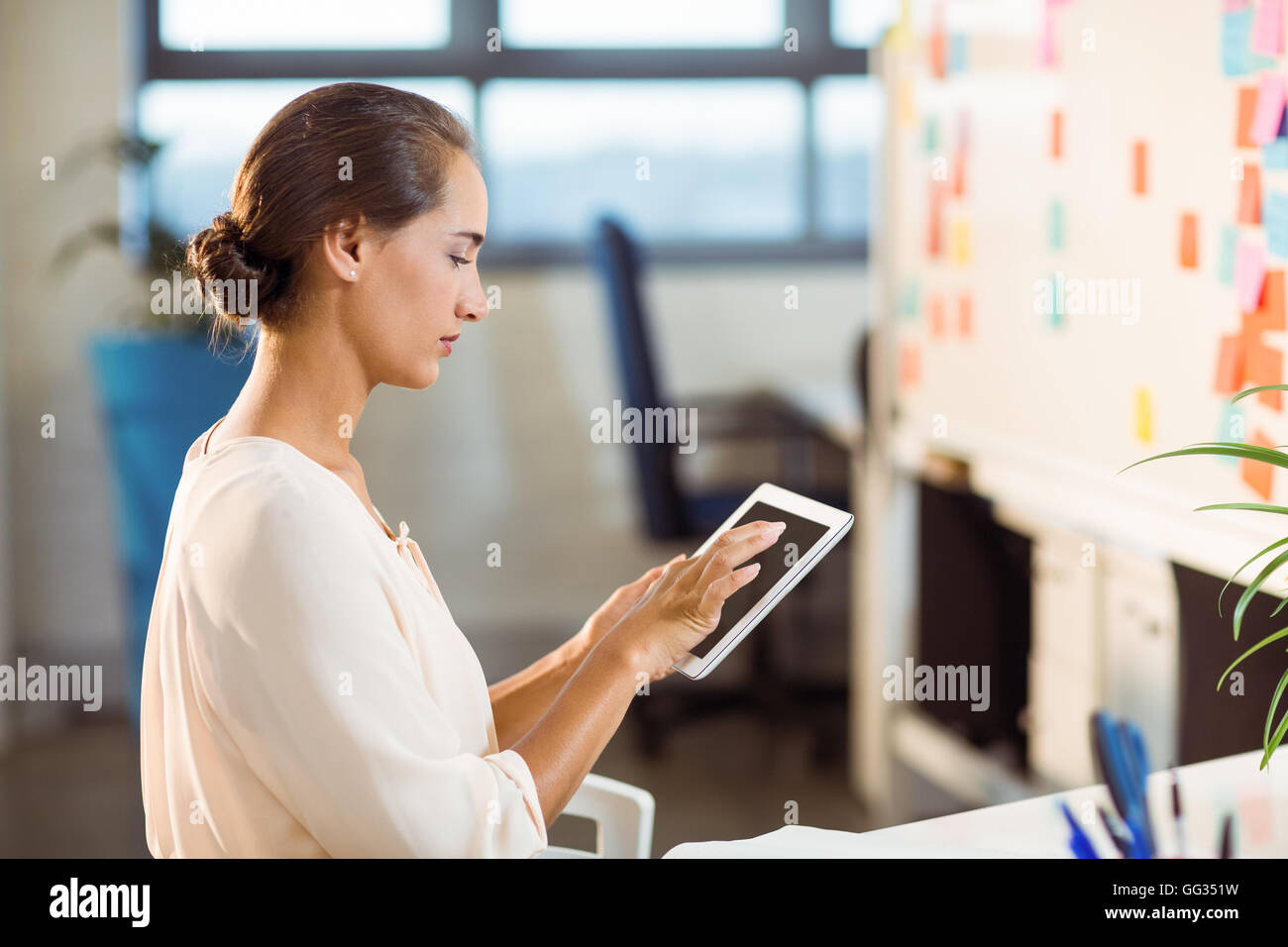 Business executive using digital tablet Stock Photo