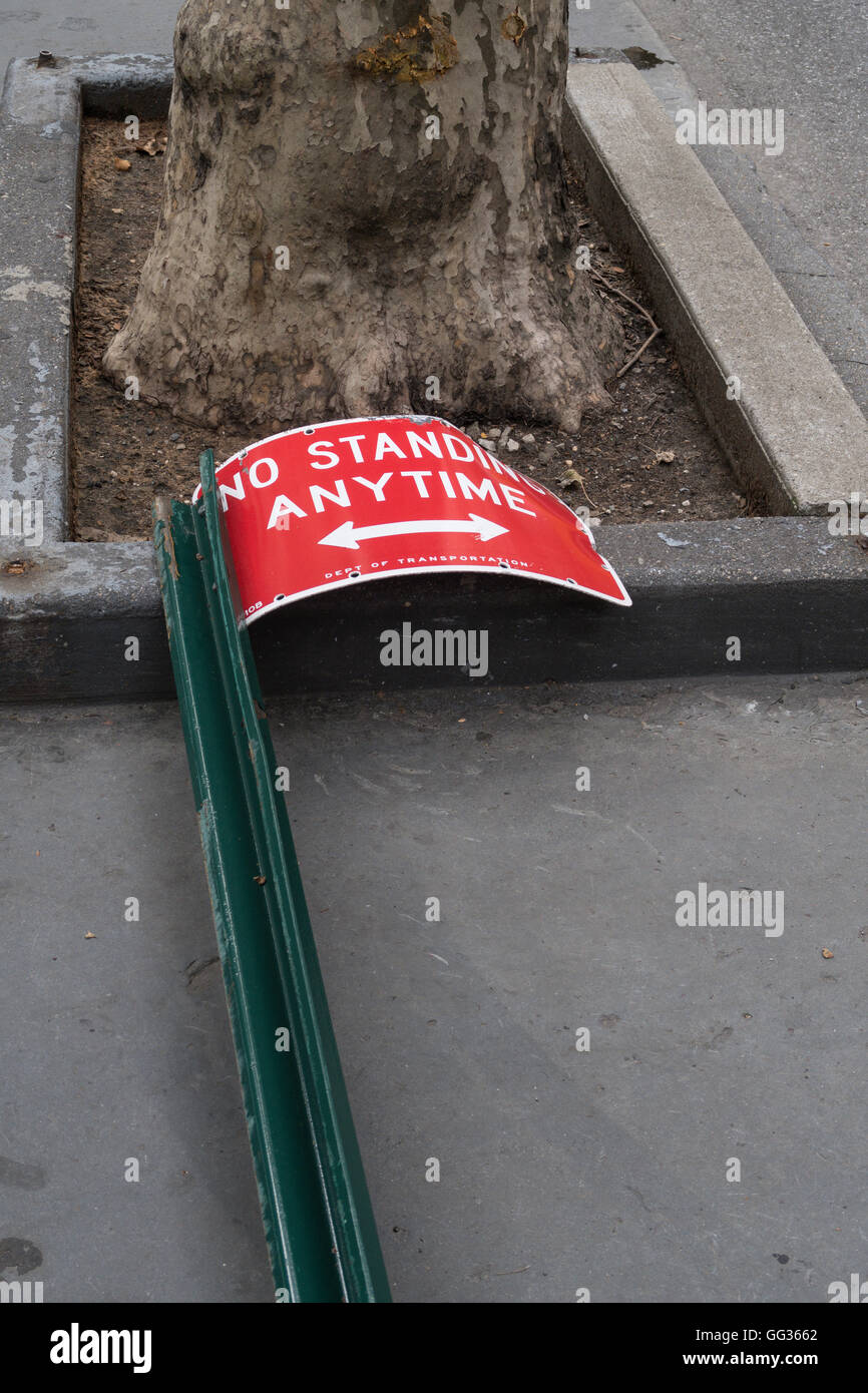 "No Standing Anytime" Street Sign Laying on Sidewalk, NYC, USA Stock