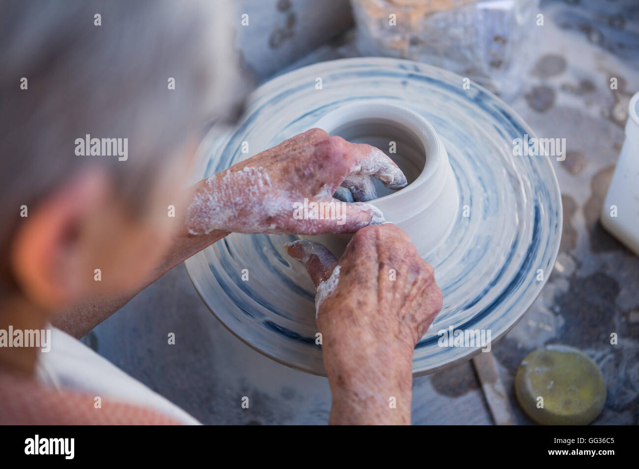 Female potter making pot Stock Photo Alamy