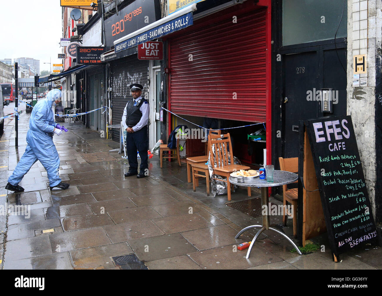 Police presence outside Efes cafe in Kilburn High Road, London where a man  was stabbed to death on Monday Stock Photo - Alamy