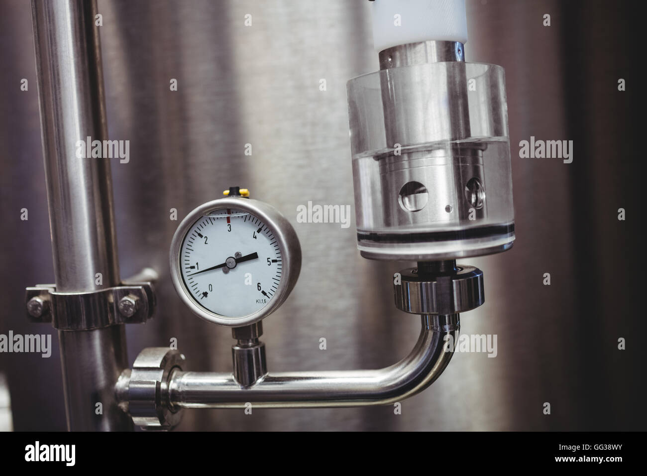 Pressure gauge on storage tank in brewery Stock Photo - Alamy