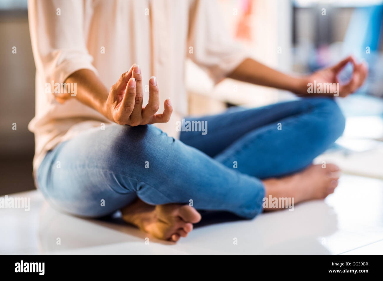Business executive performing yoga Stock Photo - Alamy