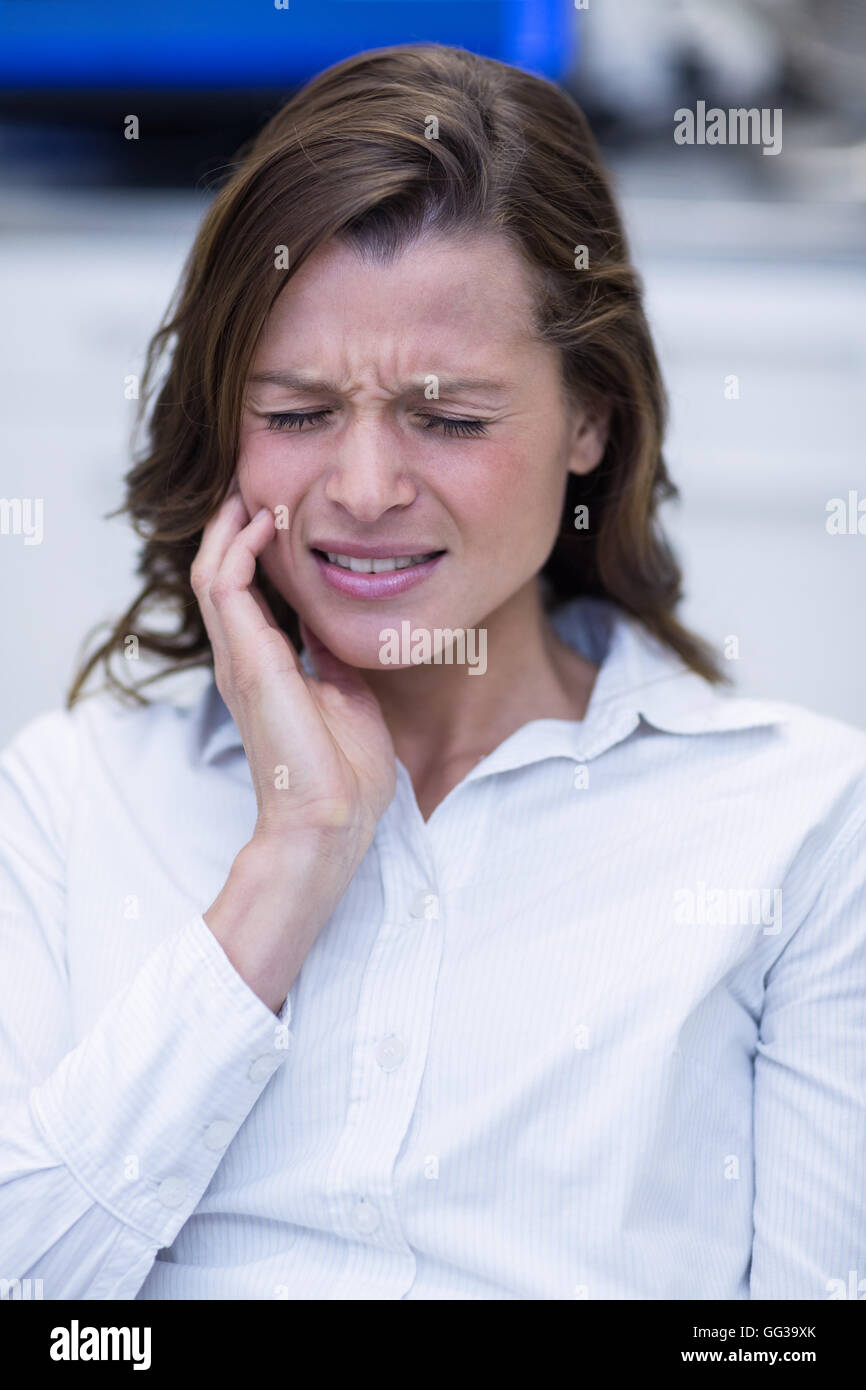 Woman suffering from toothache Stock Photo