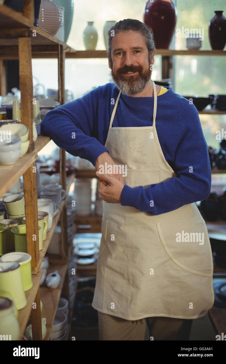 Male potter standing in pottery workshop Stock Photo - Alamy