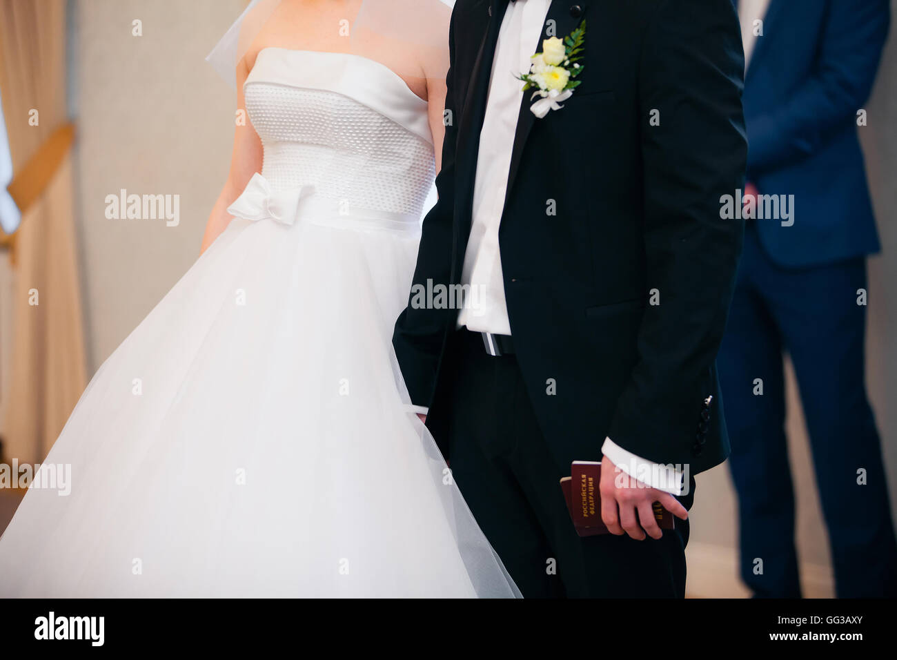 wedding theme, holding hands newlyweds Stock Photo - Alamy