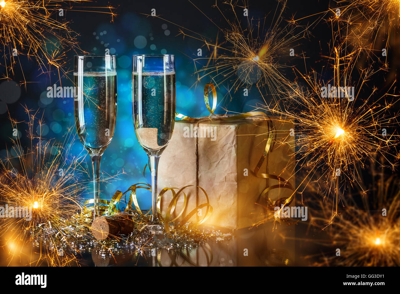 Two champagne glasses ready to bring in the New Year Stock Photo - Alamy