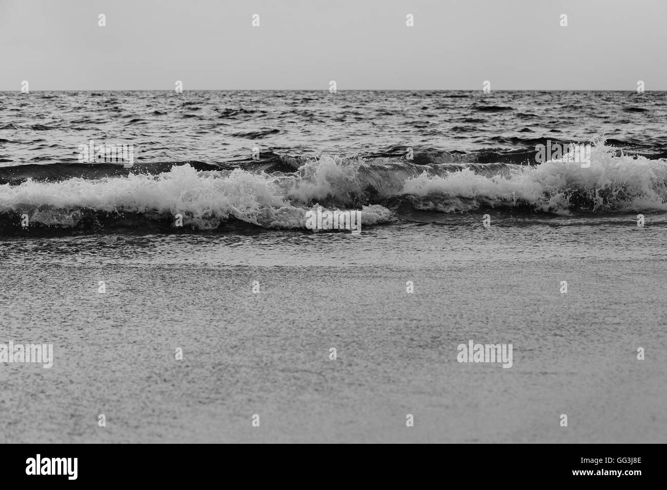 Beach sunrise of the sea with sky in twilight and morning light black ...