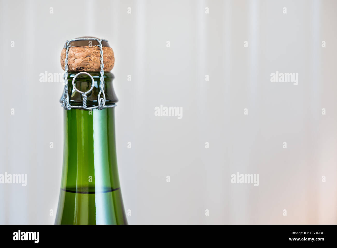 bottle of unopened sparkling wine close up Stock Photo