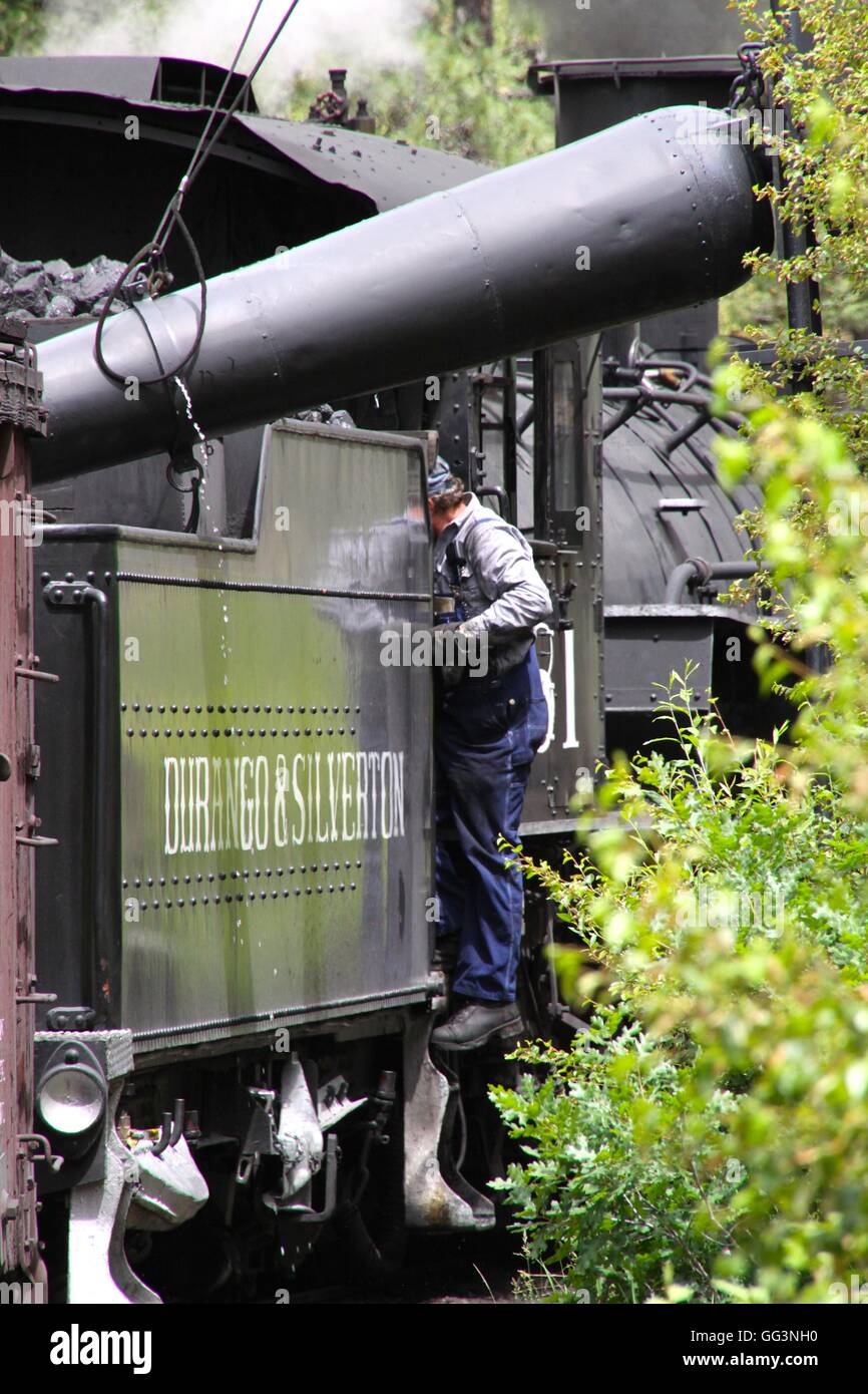 Steam locomotive taking on water on the Durango & Silverton Narrow Gauge Railroad Stock Photo