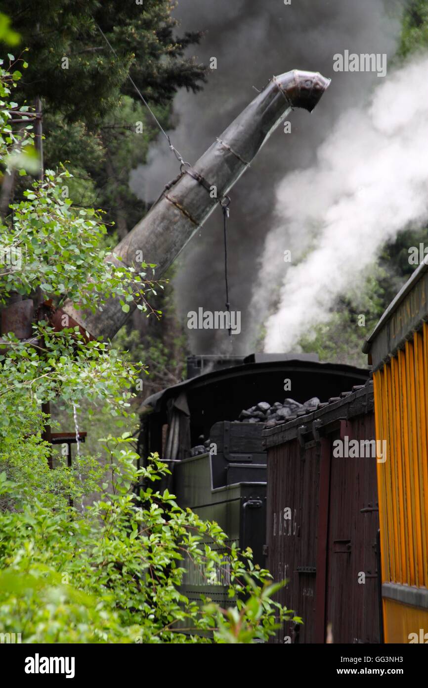 Steam locomotive taking on water on the Durango and Silverton Narrow Gauge Railroad Stock Photo